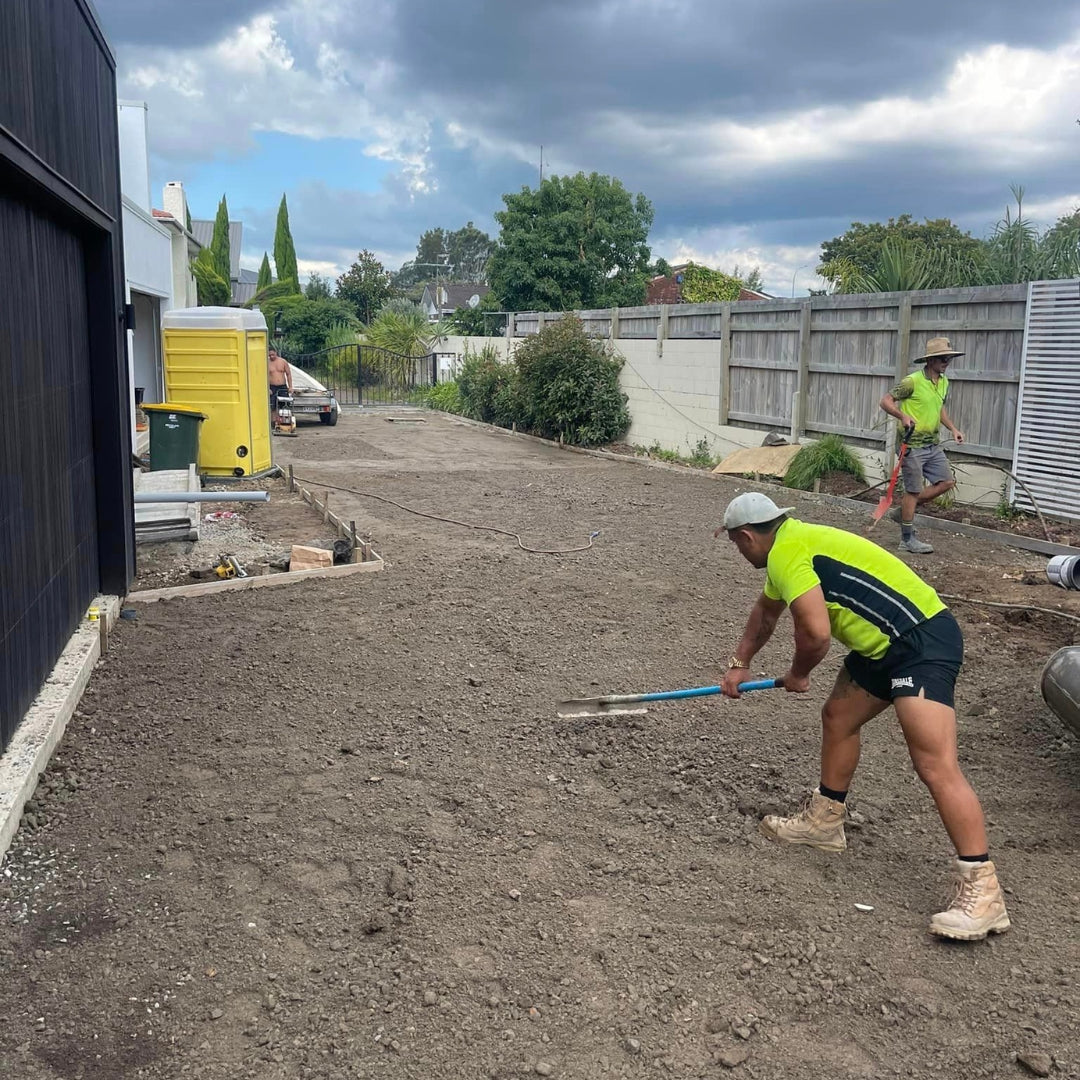 Slab Lab crew preparing and levelling the ground before a driveway pour